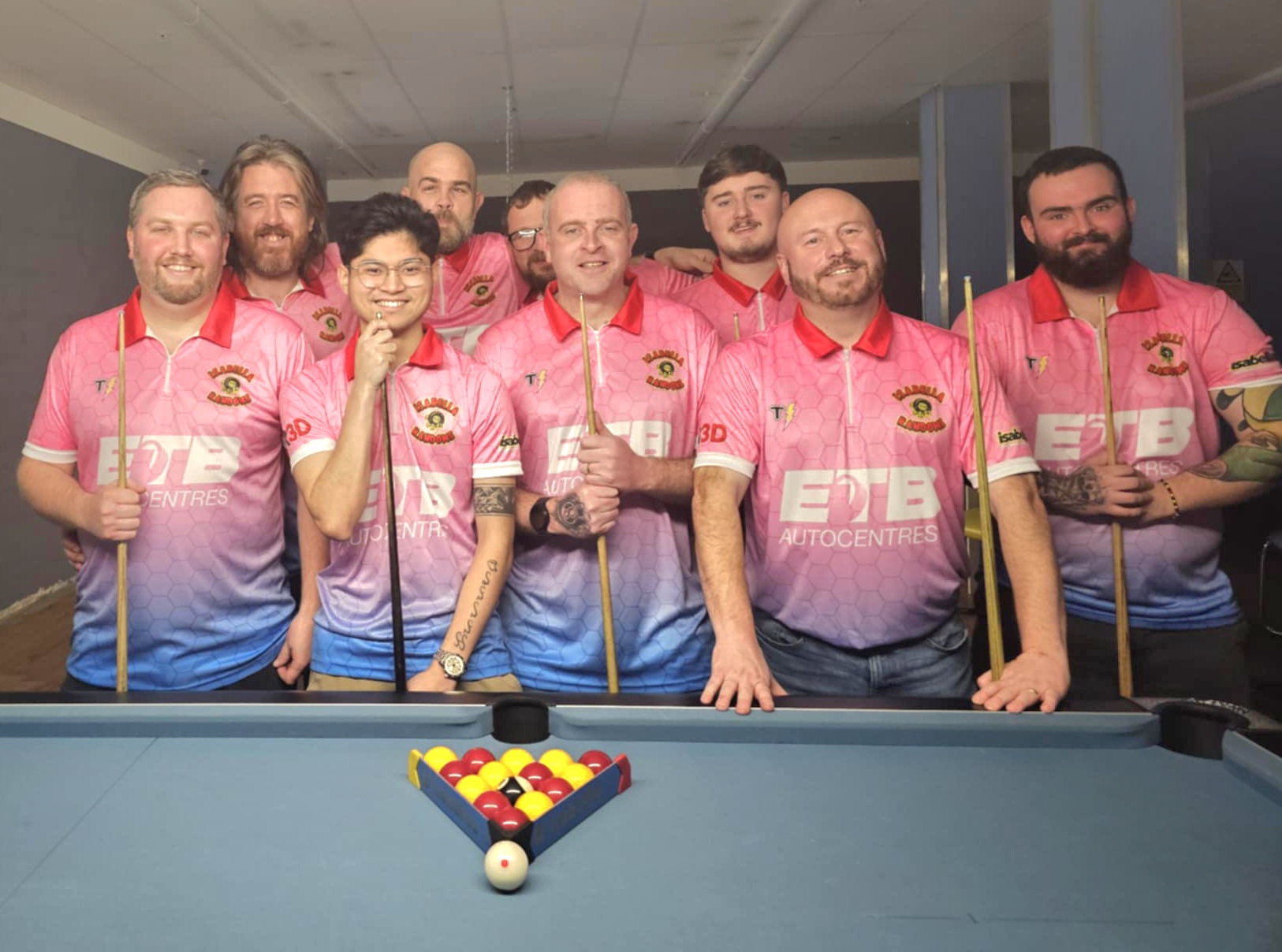 ETB’s Retail Director Paul Nunn hands over a cheque for £1,000